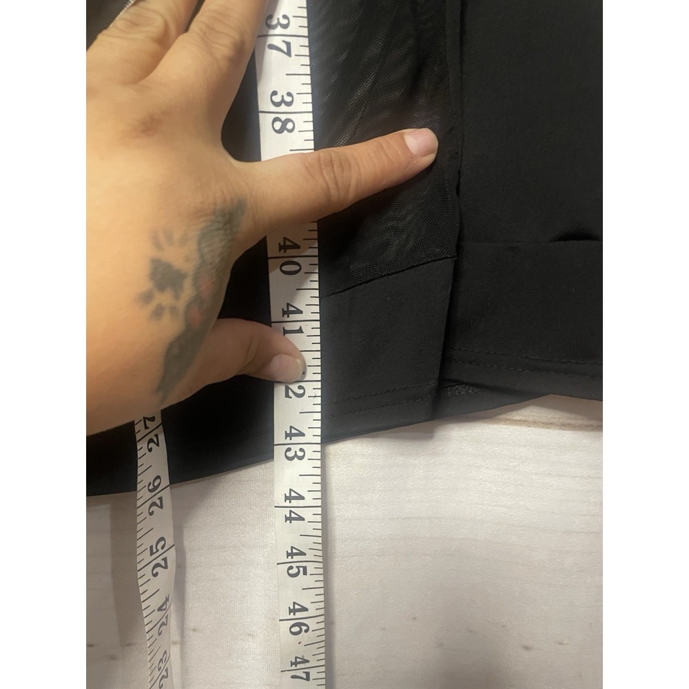 Black short-sleeve dress featuring a central sheer mesh panel detai - Picture 6 of 6